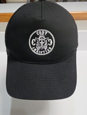 Cody Christian Merch Official "Cowboy Skull" Trucker Hat - by Port Authority